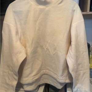 Hoka One One Women's crewneck fleece sweatshirt with rounded bottom